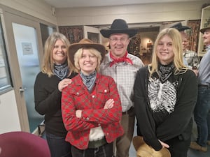 Warren Skidmore (Centre) with (L-R) Wife Isabelle and daughters Hannah and Tessa at Wordsley Green Community Centre