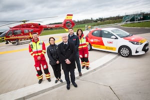 Lord directors Emma Tibbetts, second left, MD Stuart Smith and Greg Jones with the Midlands Air Ambulance team