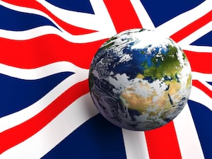 A globe on Union flag background