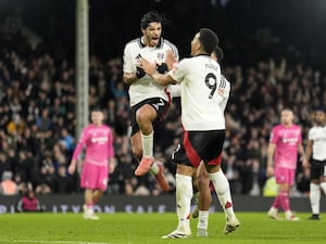 Raul Jimenez (left) celebrates after scoring Fulham's late equaliser from the spot