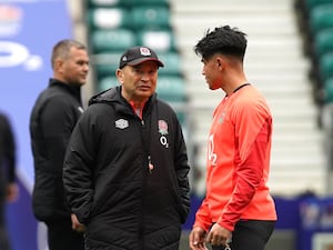 Eddie Jones (left) gave Marcus Smith (right) his Test debut in 2021