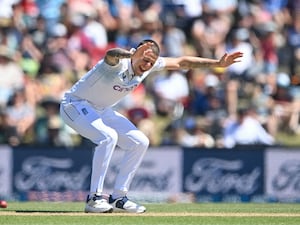 England’s Brydon Carse celebrates after taking the wicket of New Zealand’s Nathan Smith