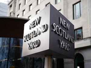 A sign for Scotland Yard