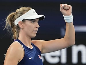 Katie Boulter reacts to winning a point against Olivia Gadecki