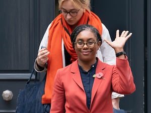 Kemi Badenoch waving