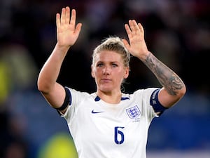 England defender Millie Bright waves to fans