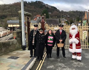 The team from the heritage railway giving out chocolates on December 8.