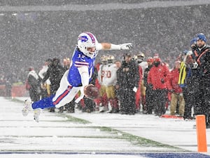 Buffalo Bills quarterback Josh Allen dives for the end zone to score