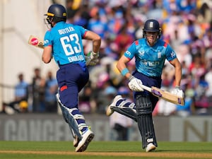 Jos Buttler, left, and Jacob Bethell bat for England