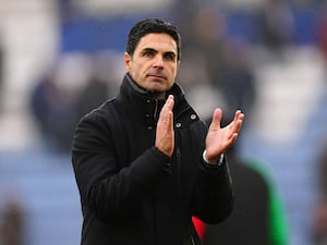 Arsenal manager Mikel Arteta applauds the visiting fans after the Premier League match at Leicester.