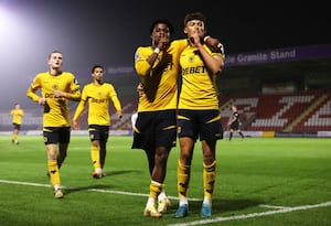 Fletcher Holman of Wolverhampton Wanderers celebrates after scoring their team's third goal during the Premier League 2 match between Wolverhampton Wanderers and Leeds United (Photo by Cameron Smith - WWFC/Wolves via Getty Images)