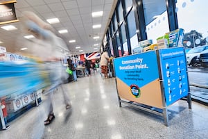 The community donation points are visible inside each Aldi store