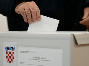 A man casts his vote in Croatia's presidential election, at a polling station in Zagreb