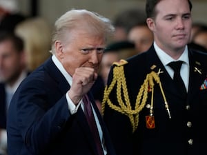 President Donald Trump gestures during the 60th Presidential Inauguration in the Rotunda of the US Capitol in Washington