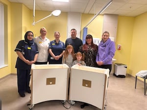 The Bereavement team from Maternity at the Midland Metropolitan University Hospital with Holly, Lee, Daisy and Chloe Gisby. 