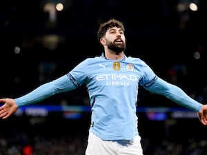 Manchester City’s Josko Gvardiol celebrates after his cross was turned in for an own goal against Club Brugge