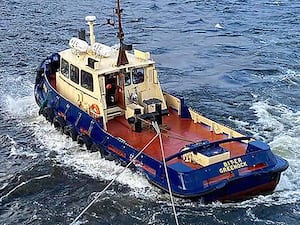 Aerial view of the Biter tug at sea