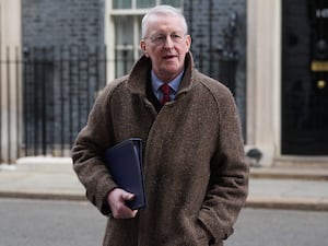 Northern Ireland Secretary Hilary Benn arrives in Downing Street for a Cabinet meeting