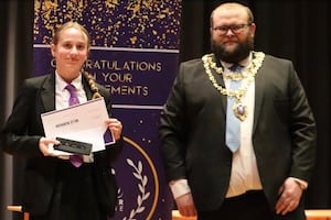 Millie Newnham receives her award from the Kidderminster Mayor