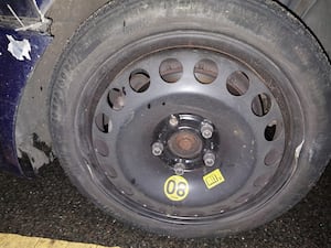 Damage near a front tyre on the car. Photo: Brierley Hill Police