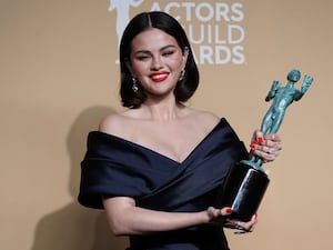 Selena Gomez with the award for outstanding performance by an ensemble in a comedy series for Only Murders In The Building. (Jordan Strauss/AP)