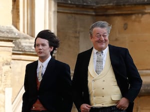 Stephen Fry and husband Elliott Spencer attend Princess Eugenie's wedding