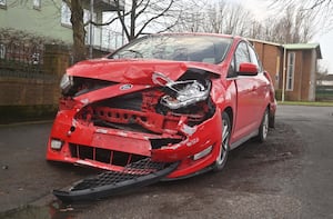 The front of a car pictured near to the scene of the crash