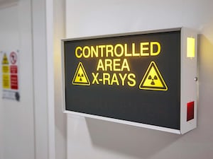 Controlled X-ray area sign in a hospital