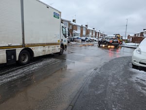 Residents of the area could be seen traversing the floodwater as Severn Trent Water teams work to clear the flood