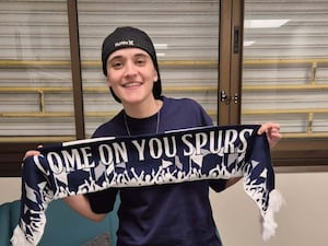 Emily Damari with a Tottenham Hotspur scarf