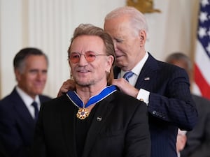 President Joe Biden presents the Presidential Medal of Freedom, the highest civilian honour in the US, to Bono