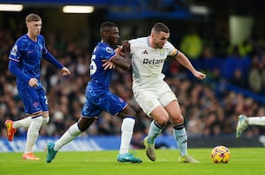 John McGinn in action at Chelsea.