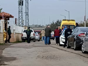 Relatives waiting for news outside the nursing home where least 10 people have died in a fire in Zaragoza, Spain