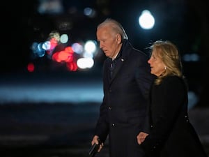 US president Joe Biden and first lady Jill Biden walk from Marine One as they arrive back at the South Lawn of the White House in Washington