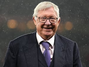 Sir Alex Ferguson smiles before Manchester United's Europa League match against FC Twente in September