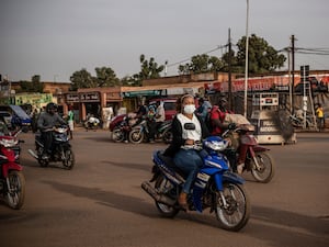 People riding scooters in Ouagadougou