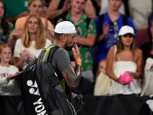 Nick Kyrgios blows a kiss to the crowd