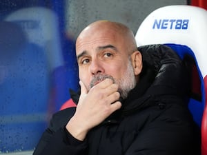 Pep Guardiola in the dugout