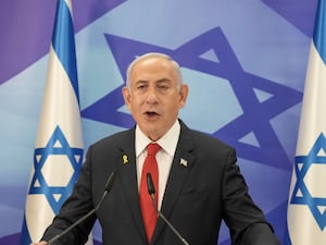 Israeli Prime Minister Benjamin Netanyahu speaking on stage