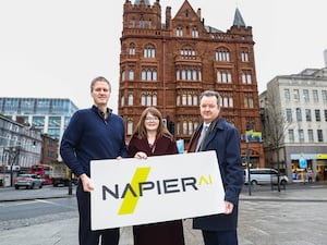 (L to R) Napier AI boss Greg Watson, Economy Minister Caoimhe Archibald and Invest NI chief Kieran Donoghue in Belfast