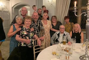 Nicola (peach flowery dress) with family and friends at her living funeral