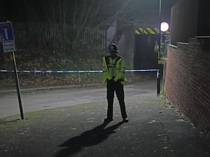 A police officer at the scene near Scribers Lane in the Hall Green area of Birmingham