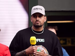 Nick Kyrgios with a microphone at Wimbledon this year