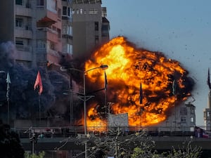 Thick smoke and flames erupt from an Israeli airstrike on Tayouneh, Beirut, Lebanon