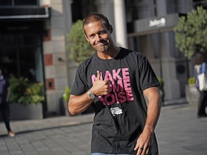 Spencer Matthews wearing a Global's Make Some Noise appeal T-shirt, doing a thumbs-up