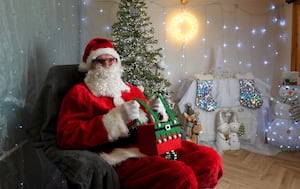 Father Christmas in the grotto at Walsall's Acorns Hospice centre 