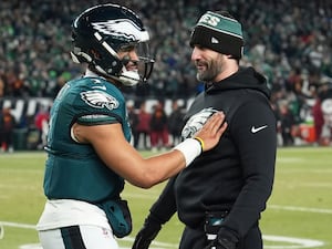 Jalen Hurts celebrates with coach Nick Sirianni