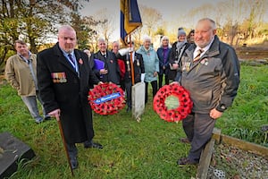 will be holding an Armistice Day commemoration. Pictured front left, Cllr Damian Corfield and John Nicholls , Commonwealth war graves volunteer.