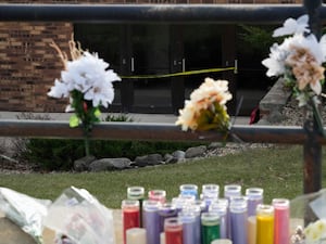 Floral tributes left outside the Abundant Life Christian School