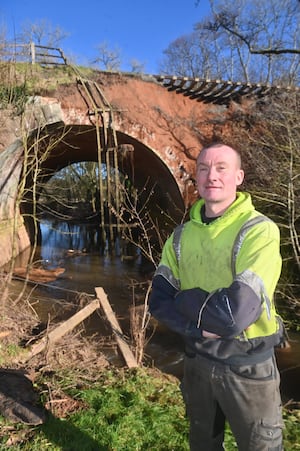 The landslide on the Severn Valley Railway, near to the Astbury Gold Course and Bridgnorth. Half of the edging stones on a bridge have gone aswel as the land. On some pics is local worker: Alex Stevens, he saw the landslide and was the one that called it in to the railway.